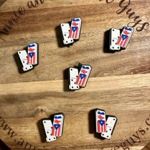 Wooden board displaying six Domino pieces with Puerto Rican flag design and "Annie and the Five Guys" branding.